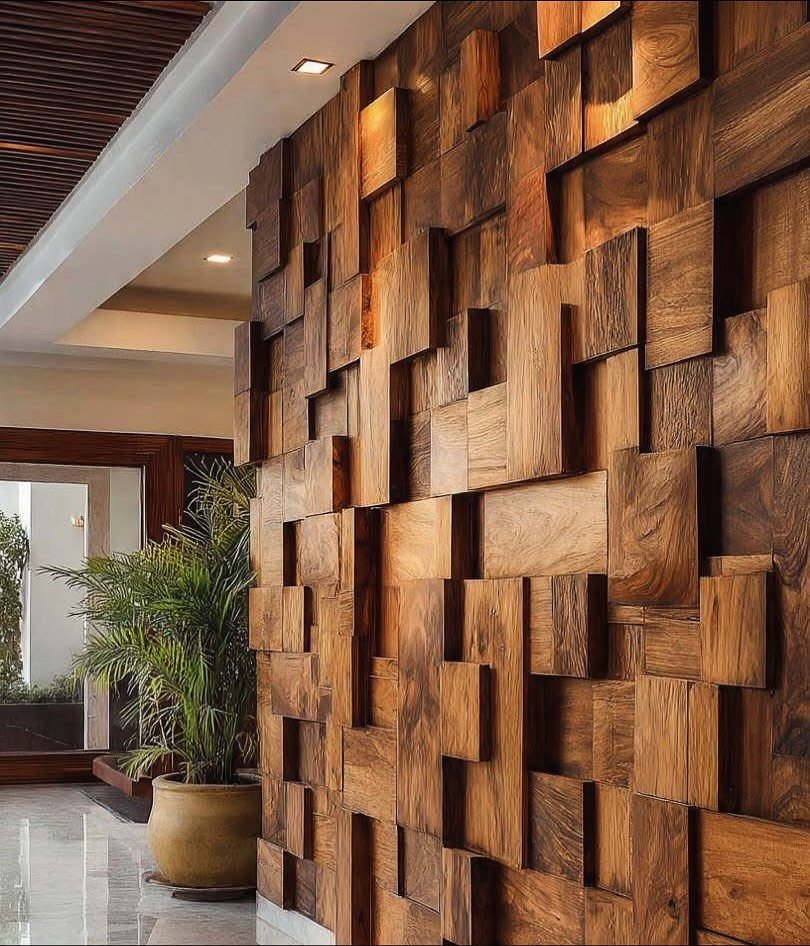 Three-dimensional wooden blocks of varying depths arranged in a geometric pattern on a large interior wall.